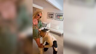 Britney Spears puts on her green dress and let her friends have fun with her