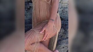 Lusty Beauty Nipple Slip While Wearing See Through on Beach Video