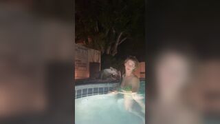 Young Beauty Talking to Her Fans While Wearing Bikini in Pool Video