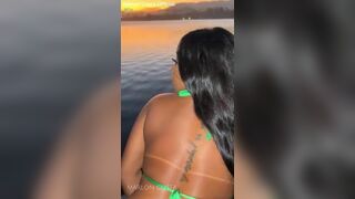 Carioca pocahontas suckling and fucking with black man on the pier of the outdoor lake