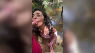Moon Souza suckling and fucking in the outdoor waterfall