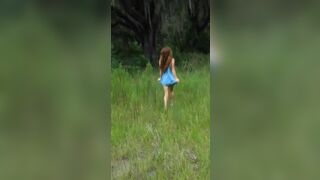 Amazing nude girl in the woods touching herself
