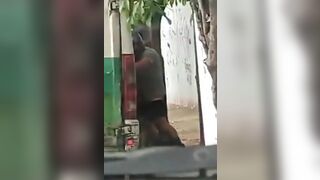 Crazy public video with a guy wearing a helmet sucking on the dick of a tranny.