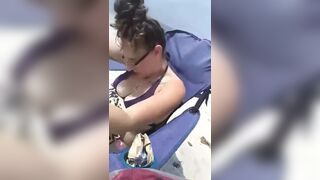 Milf gets super wet touching her hairy pussy at the public beach