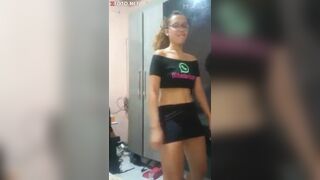 Blonde dancing in a skirt without panties