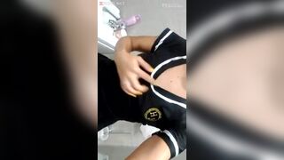 Skinny girl dressed as a schoolgirl masturbating