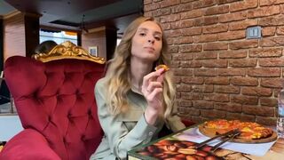 Dirty girl plays with her pussy in a pizza restaurant.