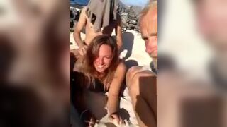 Wife getting fucked on the beach in front of hubby during a holiday.