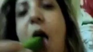 Chudasi Aunty first sucked the cucumber to her heart’s content and then inserted it in her pussy
 Indian Video Tape