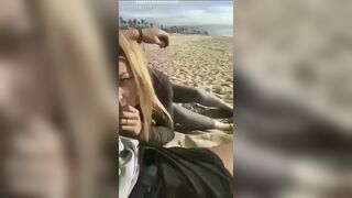 Sweet amateur blonde doing a blowjob on a public beach