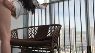 Amateur couple having porn on the balcony while enjoying the view