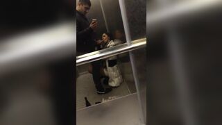 Guy gets a free blowjob in a public elevator