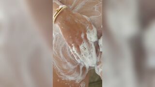 HOT BLONDE WITH JUICY TITTIES TAKES A BATH AND MASTURBATES