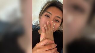 Amateur Asian Babe Sucking Her Toes