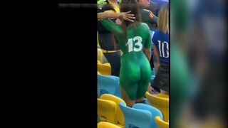 Beautiful Latina with hot ass and body dances nude in public stadium
