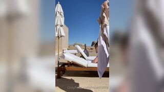 Mia Khalifa Taking A Sunbath Covering Her Boobs Onlyfans Leaked Video
