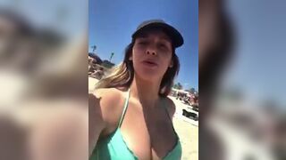 Gorgeous cute teen just flashing her perfect boobs at the beach