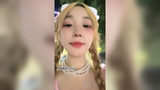 Asian Cosplay Girl Reveals Her Tiny Tits at Street Video