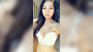 Pretty Japanese Babe Showing Off Her Sexy Body Video