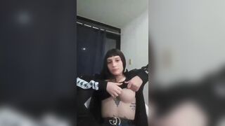 Gorgeous Latina shows a boob with no intention