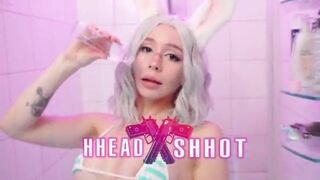 Bunny cosplayer fucks herself with dildo while wearing knee-high socks