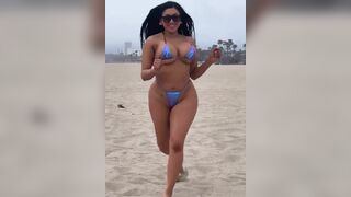 Busty Babe Jiggles Her Boobs and Booty While Running on Beach Video