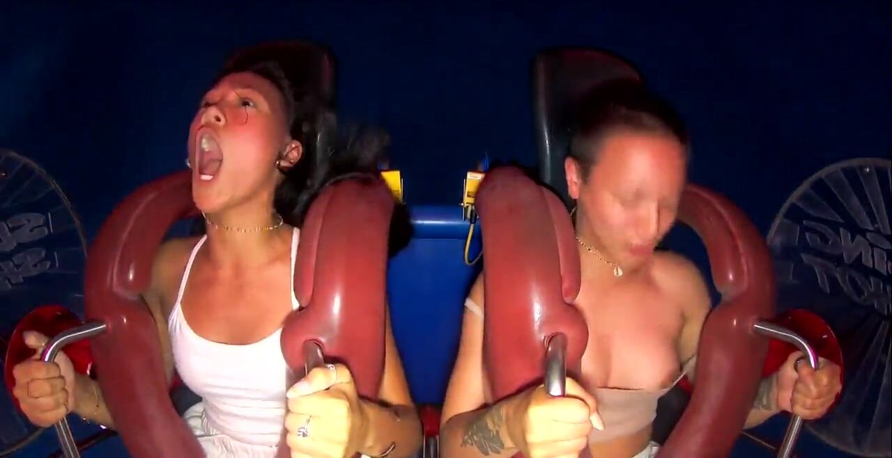 Tits pop out on slingshot ride
